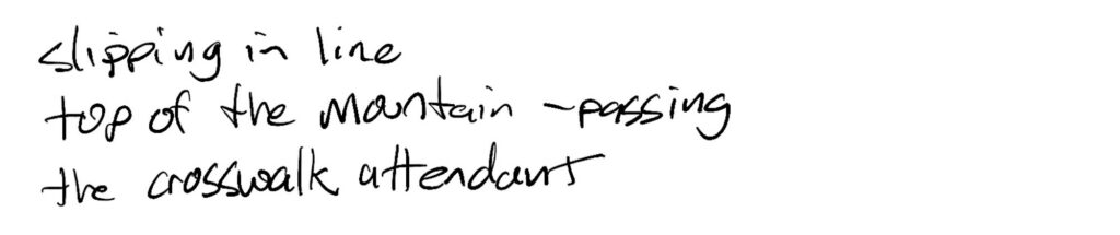 Haiku; slipping in lie / top of the mountain —passing / the crosswalk attendant