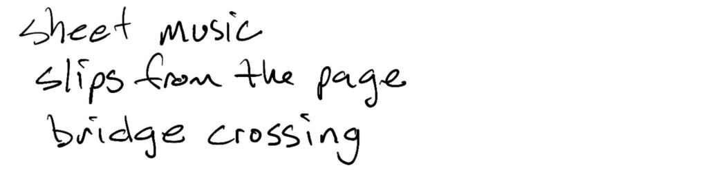 Haiku; sheet music / slips from the page / bridge crossing
