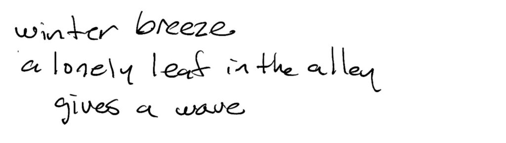 Haiku; winter breeze / a lonely leaf in the alley / gives a wave