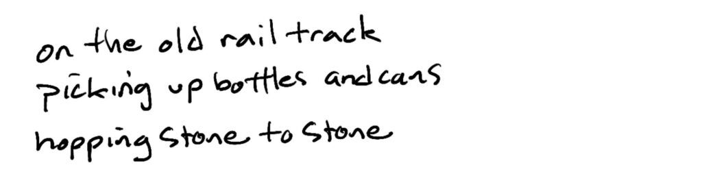 on the old rail track/picking up bottles and cans/hopping stone to stone